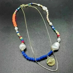 Layered bead and gold charm necklace 💗